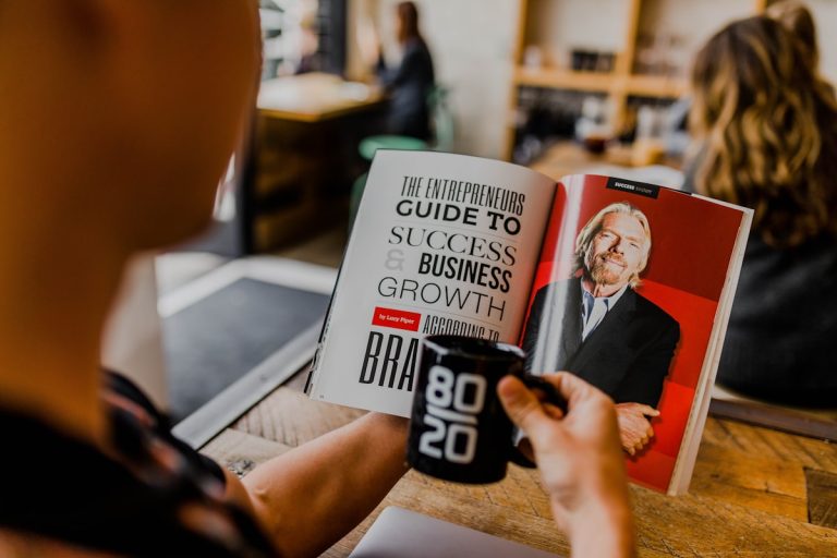 A professional reviewing business growth charts and investment reports