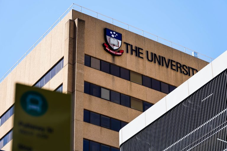 a building with a sign that says the university on it