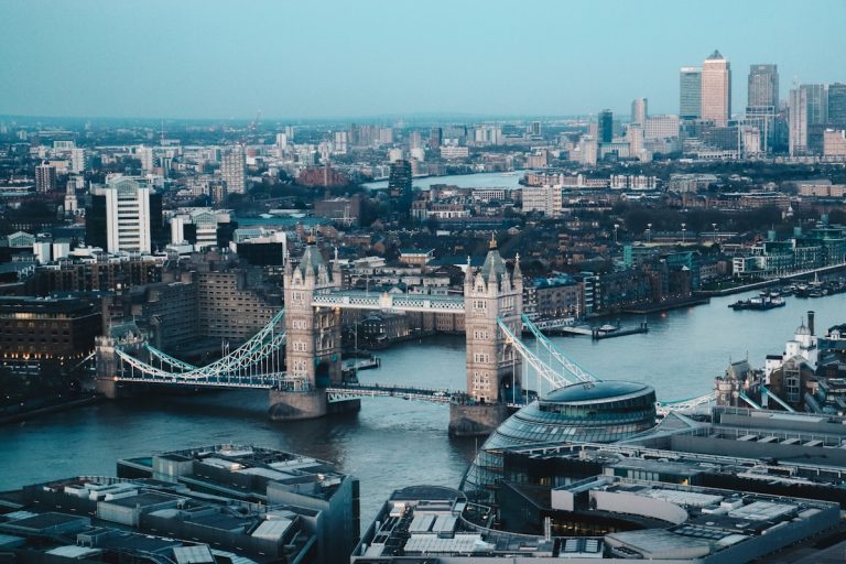 Aerial view of london with tower bridge and city skyline.