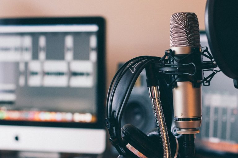 A microphone and headphone setup for audio broadcasting